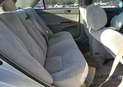 2003 Toyota Camry Le z USA, uszkodzony, nr VIN 4T1BE32K03U699438